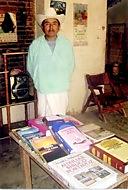 Pastor with library