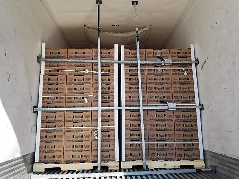 Jack Load Bar Securing A Pallet In A Dry Van Trailer  Trucking Depot