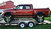 Lasso Strap In Use Securing Pickup Truck On Trailer | Trucking Depot