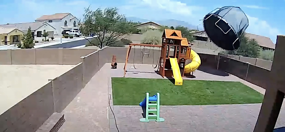 Trampoline blowing away in the wind caught on camera