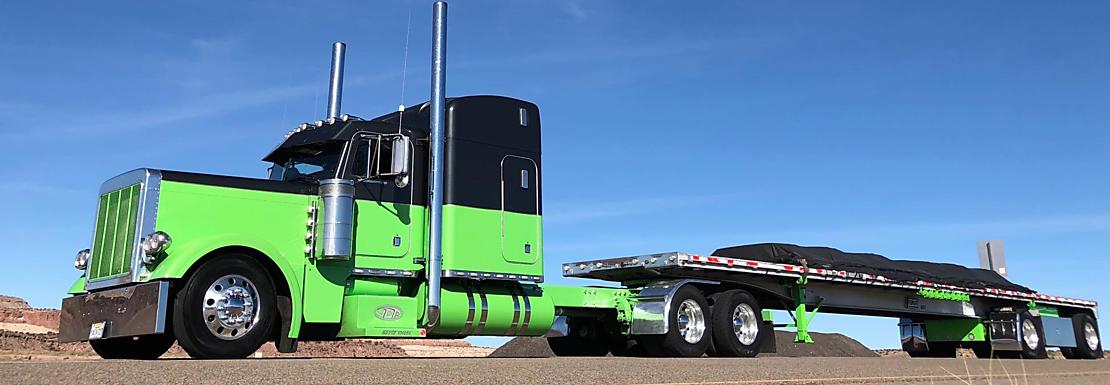 Semi Truck using working load limit straps to secure cargo