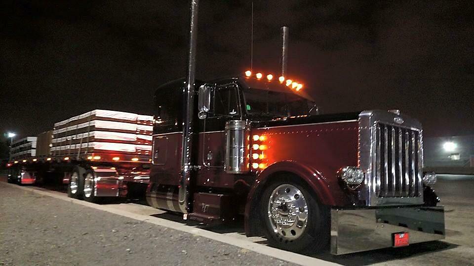 Semi Truck Loading Up at Night for the road with tie downs