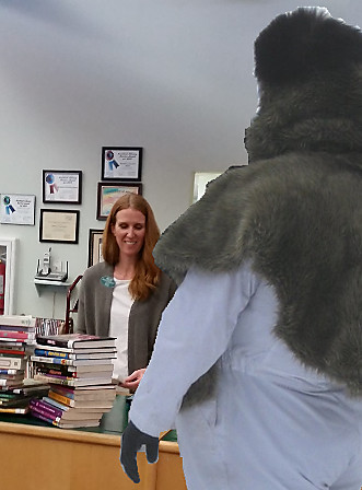 A Yeti Checks Out Books at the Library